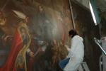 Pulitura di un grande dipinto della cattedrale di Ancona